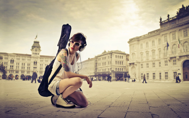 Woman kneeling guitar case backpack #2 free wallpaper for desktop - medium preview image