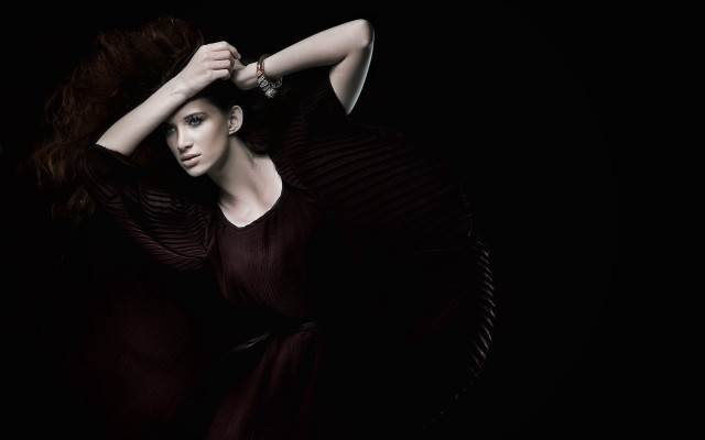 Woman black dress holding hair #2 free wallpaper for desktop - medium preview image