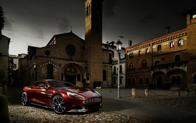 Red sports car clocktower night free wallpaper for desktop - medium preview image