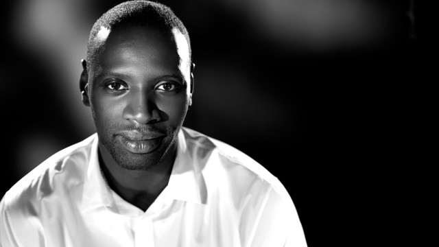 Serious man white shirt bald free wallpaper for desktop - medium preview image