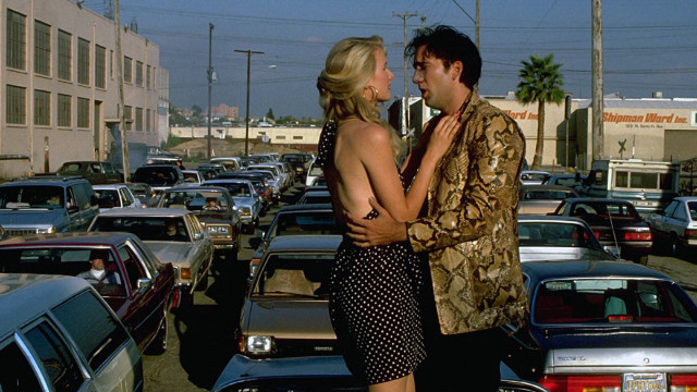 Man woman parking lot cars free wallpaper for desktop - medium preview image