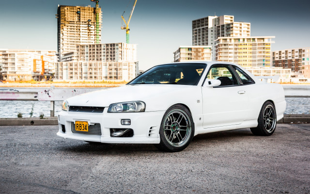 White car city skyline crane free wallpaper for desktop - medium preview image