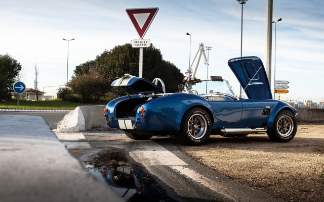 Blue sports car hood open #2 free wallpaper for desktop - medium preview image