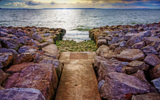 Stone wall walkway ocean cloudy free wallpaper for desktop - medium preview image