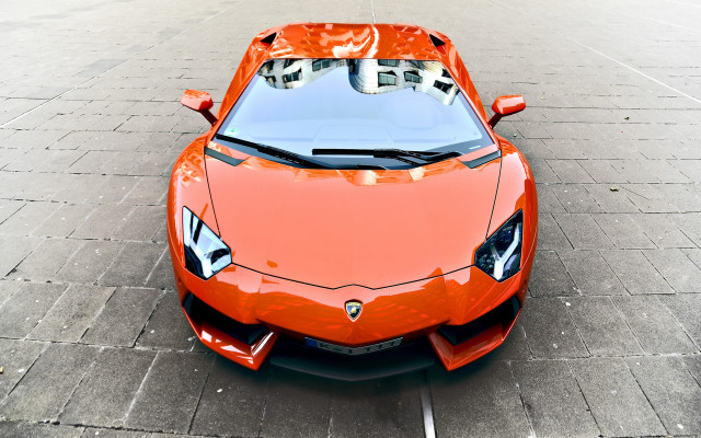 Orange sports car hood up free wallpaper for desktop - medium preview image