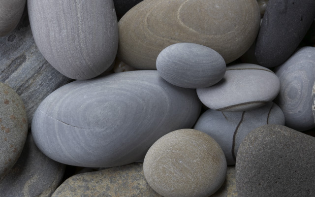 Pile rocks circular design grey free wallpaper for desktop - medium preview image