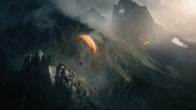Paraglider mountain range cloudy sky free wallpaper for desktop - medium preview image