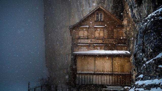 Wooden building snow storm cliff free wallpaper for desktop - medium preview image