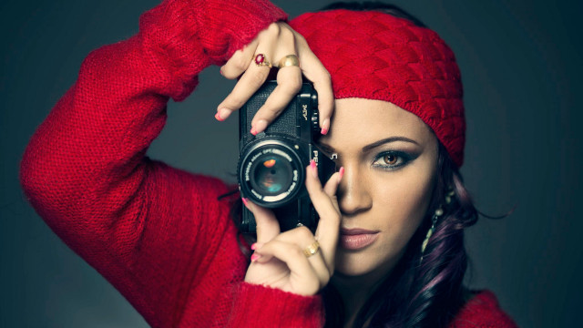 Woman red sweater camera holding free wallpaper for desktop - medium preview image