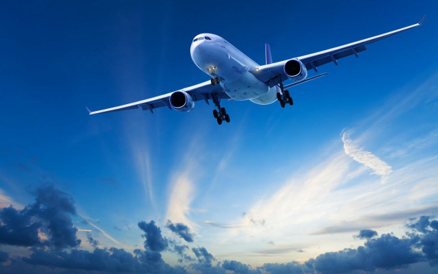 Large jetliner blue cloudy sky #3 free wallpaper for desktop - medium preview image