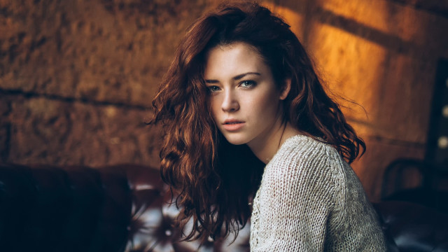 Woman long hair couch brick free wallpaper for desktop - medium preview image