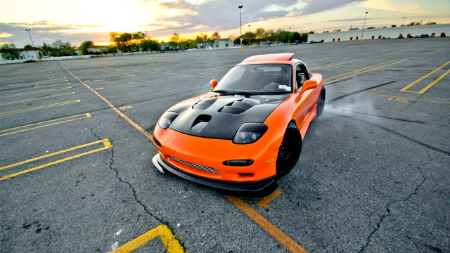 Orange sports car parking lot #10 free wallpaper for desktop - medium preview image