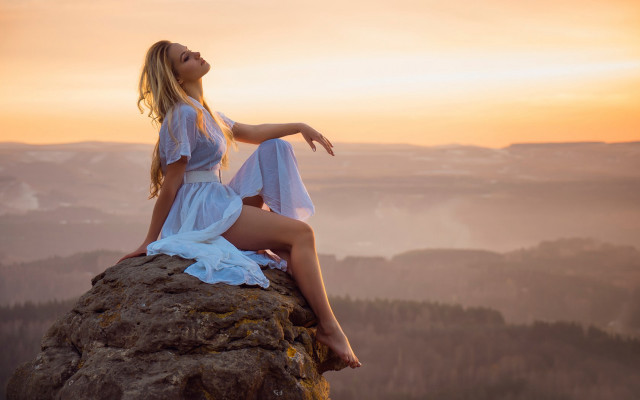 Woman rock sitting beach sunset free wallpaper for desktop - medium preview image