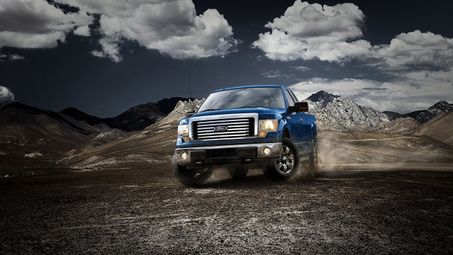 Blue truck desert mountains clouds free wallpaper for desktop - medium preview image