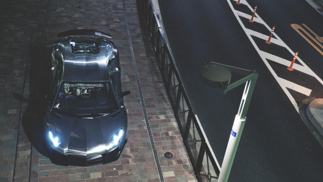 Car brickroad fence streetsign trafficlight free wallpaper for desktop - medium preview image