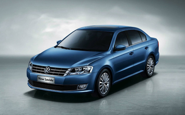 Blue volkswagen sedan dark room free wallpaper for desktop - medium preview image