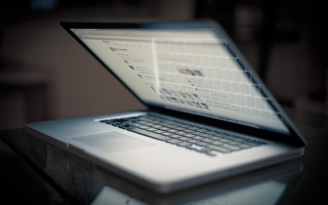 Laptop table mouse keyboard blurry free wallpaper for desktop - medium preview image