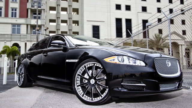 Black car tokyo building fence free wallpaper for desktop - medium preview image