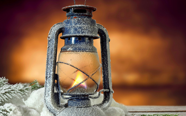 Candle lit snowy lantern evocative free wallpaper for desktop - medium preview image