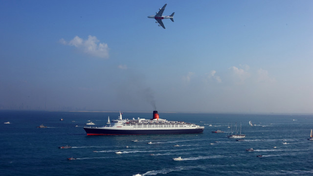 Ocean ship plane beach sky free wallpaper for desktop - medium preview image