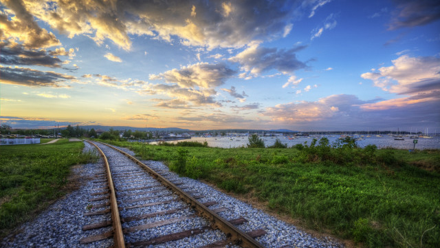 Sunset traintrack water boat city free wallpaper for desktop - medium preview image