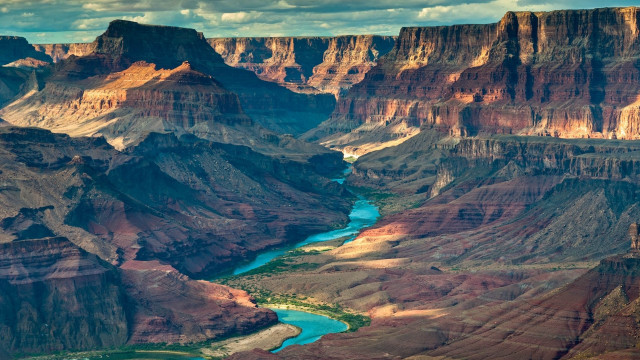 River canyon mountains clouds cityscape free wallpaper for desktop - medium preview image