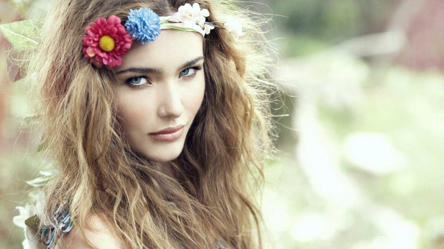 Woman flower hair fur portrait free wallpaper for desktop - medium preview image