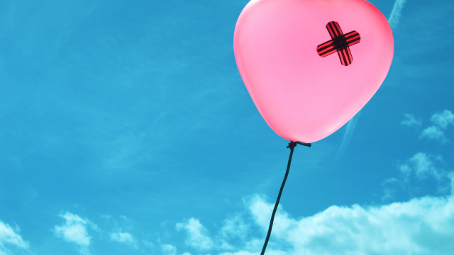 Pink balloon cross floating blue free wallpaper for desktop - medium preview image