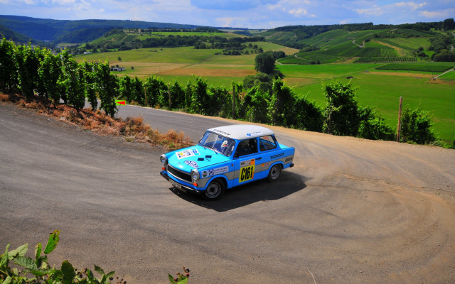 Blue car dirt road green free wallpaper for desktop - medium preview image