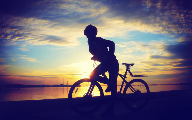 Beach biking sunset sky silhouette free wallpaper for desktop - medium preview image