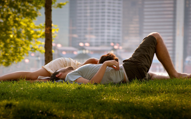 Romantic park couple grass city free wallpaper for desktop - medium preview image