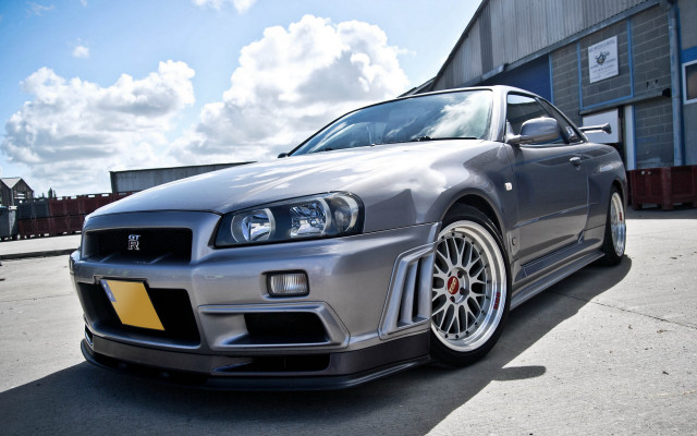 Silver car building sky clouds free wallpaper for desktop - medium preview image
