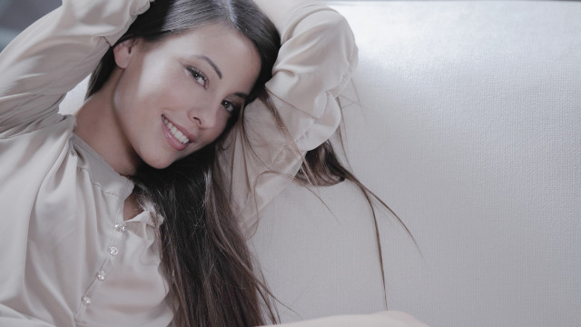 Woman couch ponytail laptop white free wallpaper for desktop - medium preview image