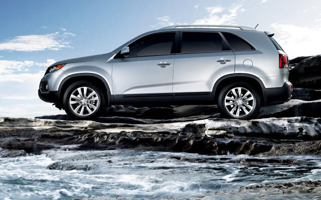Silver suv rocky shore river free wallpaper for desktop - medium preview image