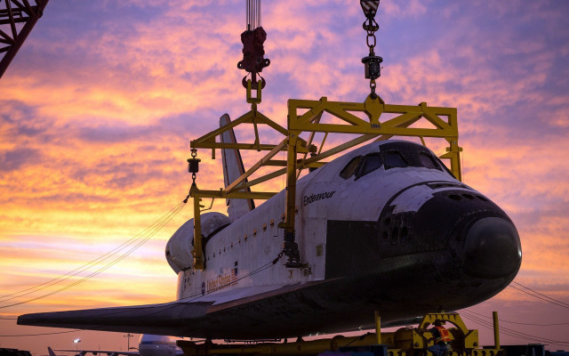 Space shuttle crane sunset cloudy free wallpaper for desktop - medium preview image