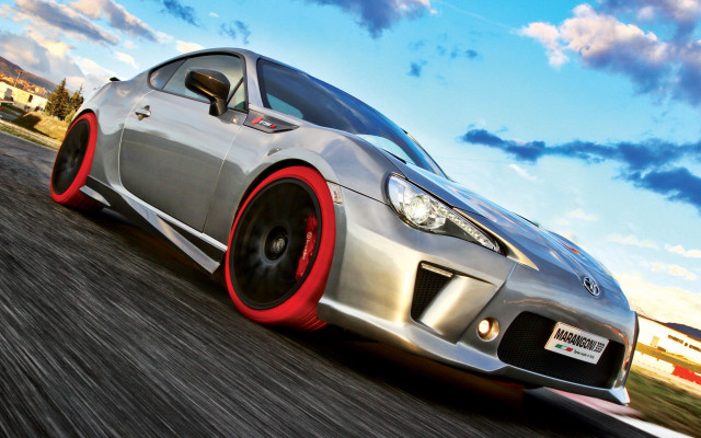 Silver sports car red rims free wallpaper for desktop - medium preview image