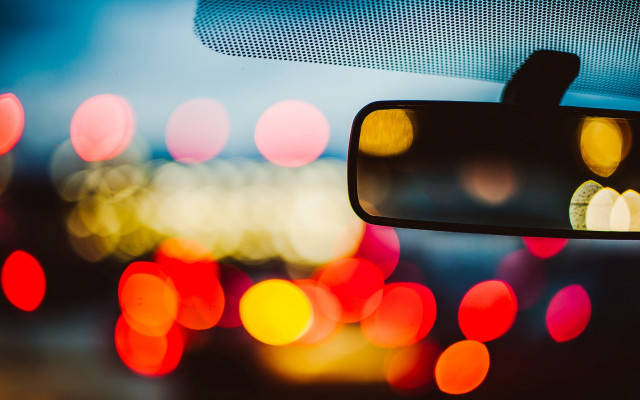 Rearview mirror bokeh lights fence free wallpaper for desktop - medium preview image