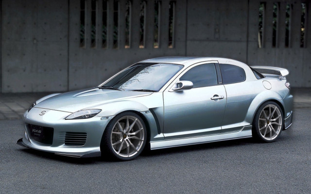 Silver sports car building parking free wallpaper for desktop - medium preview image