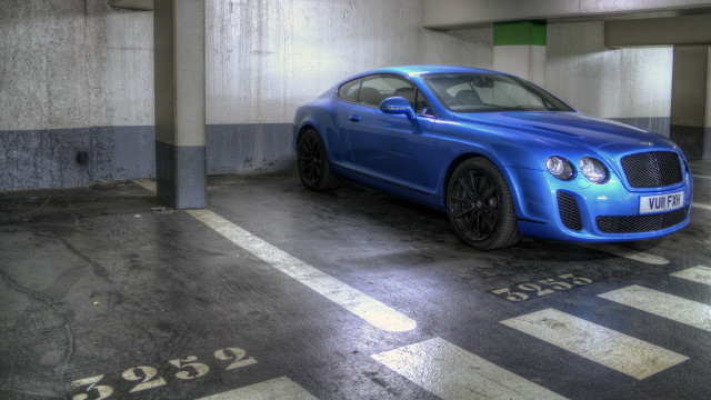 Blue car parking garage vroom free wallpaper for desktop - medium preview image