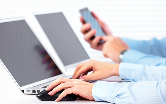 Person laptop cellphone mouse technology free wallpaper for desktop - medium preview image