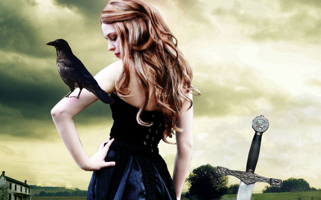Woman black dress holding bird free wallpaper for desktop - medium preview image
