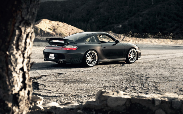 Black sports car dirt road #4 free wallpaper for desktop - medium preview image