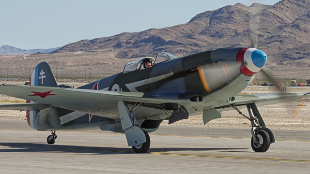 Small airplane propeller runway mountains free wallpaper for desktop - medium preview image