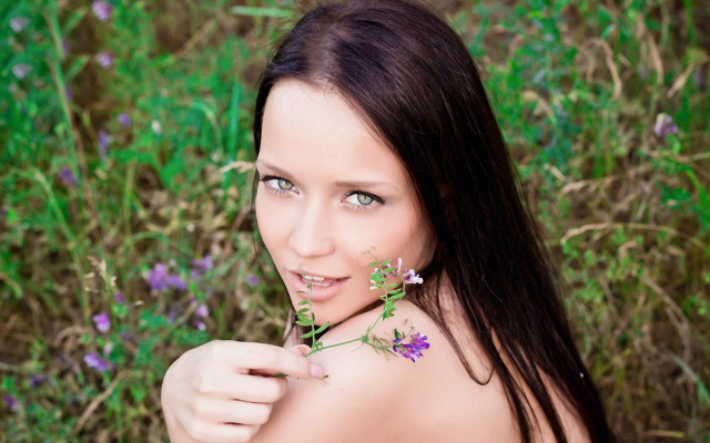 Woman flower field green eyes free wallpaper for desktop - medium preview image