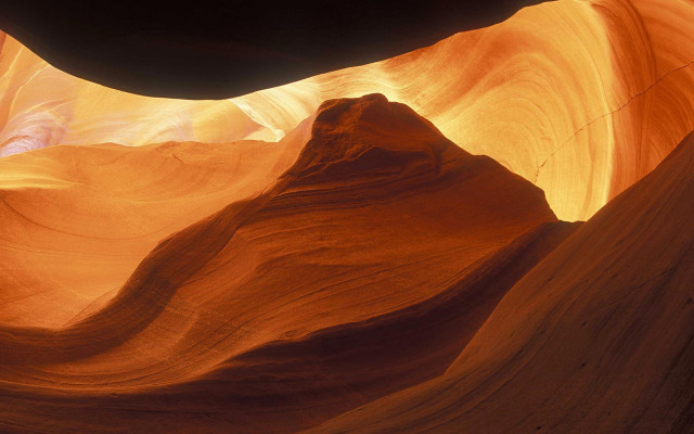 Large rock formation central cave free wallpaper for desktop - medium preview image