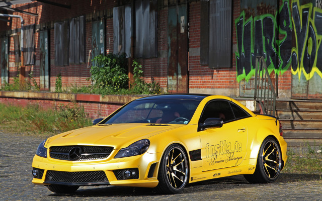 Yellow mercedes slk graffiti building free wallpaper for desktop - medium preview image