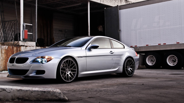 Silver car truck parking lot free wallpaper for desktop - medium preview image