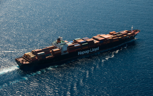 Cargo ship ocean containers man free wallpaper for desktop - medium preview image