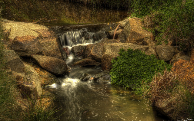Small waterfall rocky area bush free wallpaper for desktop - medium preview image