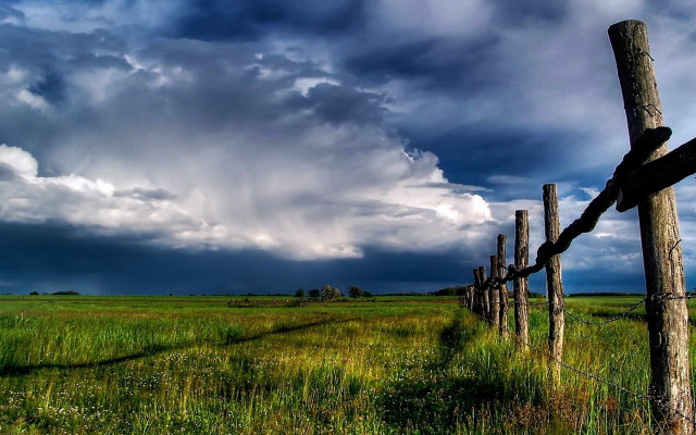 Wooden fence stormy sky city free wallpaper for desktop - medium preview image